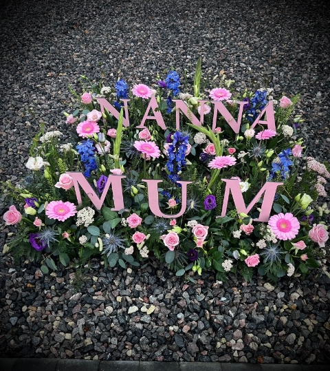 Wooden Letters in a Garden