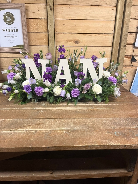 Wooden Letters in a Garden